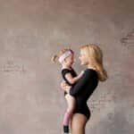 ballerina mom and daughter in the Studio in black gymnastic swimwear
